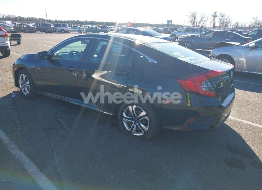 Photo 3 of 2018 Honda Civic LX (VIN 2HGFC2F57JH581110)