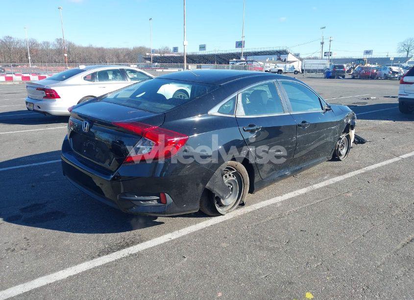 Photo 4 of 2018 Honda Civic LX (VIN 2HGFC2F57JH581110)