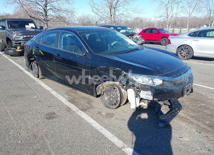 Photo 6 of 2018 Honda Civic LX (VIN 2HGFC2F57JH581110)