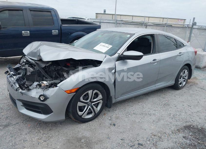 Photo 2 of 2018 Honda Civic LX (VIN 2HGFC2F57JH588722)