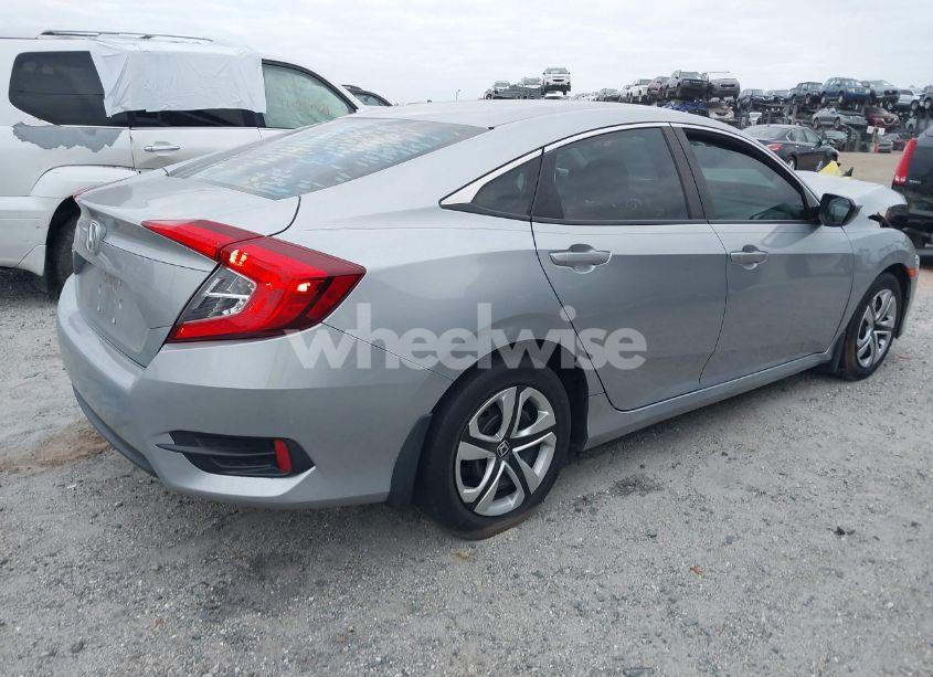 Photo 4 of 2018 Honda Civic LX (VIN 2HGFC2F57JH588722)