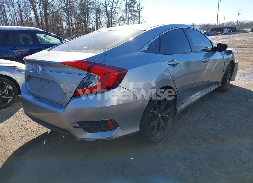 Photo 4 of 2018 Honda Civic LX (VIN 2HGFC2F57JH592270)