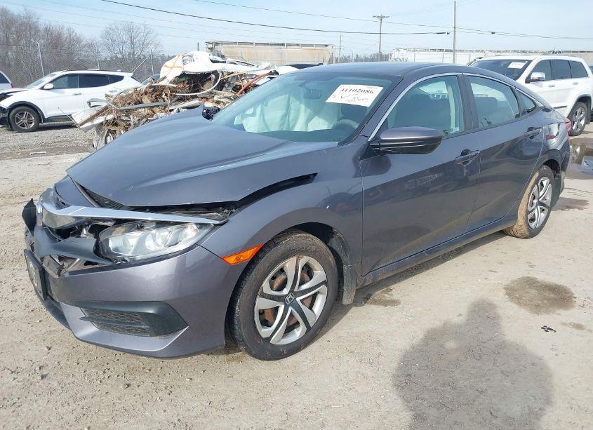 Photo 2 of 2018 Honda Civic LX (VIN 2HGFC2F57JH594133)