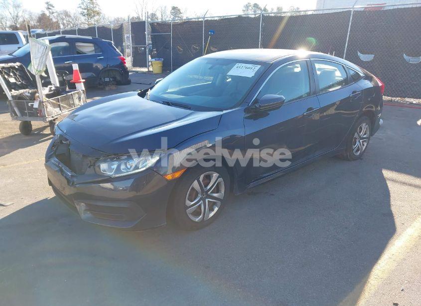 Photo 2 of 2018 Honda Civic LX (VIN 2HGFC2F57JH606765)