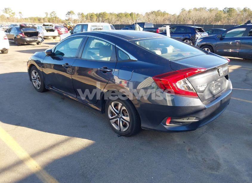 Photo 3 of 2018 Honda Civic LX (VIN 2HGFC2F57JH606765)