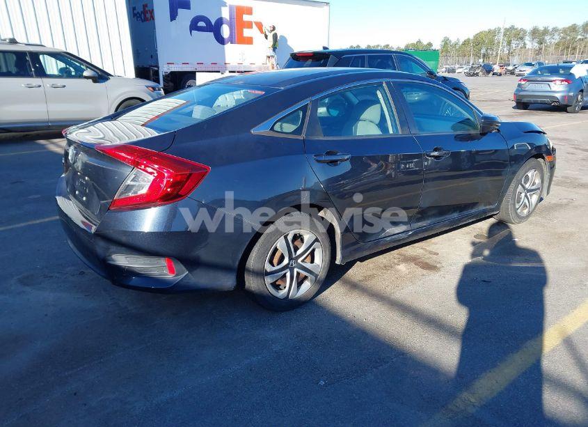 Photo 4 of 2018 Honda Civic LX (VIN 2HGFC2F57JH606765)