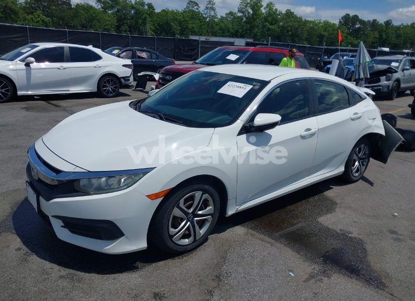 Photo 2 of 2017 Honda Civic LX (VIN 2HGFC2F58HH552449)