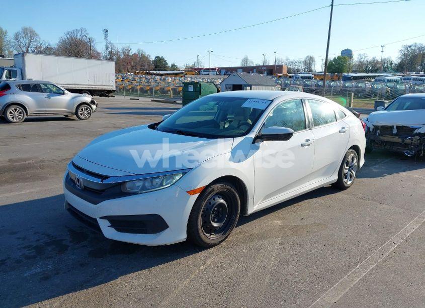 Photo 2 of 2018 Honda Civic LX (VIN 2HGFC2F58JH507677)