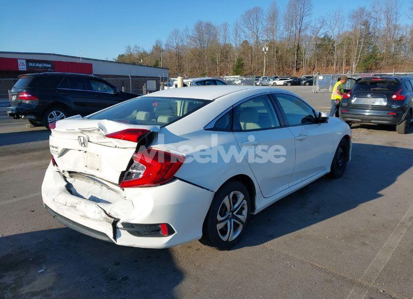 Photo 4 of 2018 Honda Civic LX (VIN 2HGFC2F58JH507677)