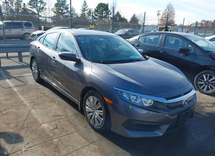 2018 Honda Civic LX (VIN 2HGFC2F58JH520509) main photo