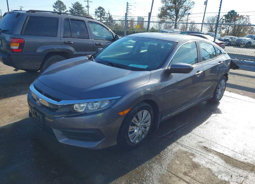 Photo 2 of 2018 Honda Civic LX (VIN 2HGFC2F58JH520509)