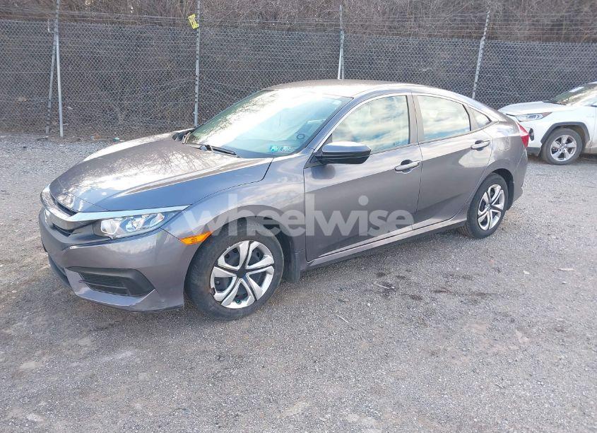 Photo 2 of 2018 Honda Civic LX (VIN 2HGFC2F58JH520543)