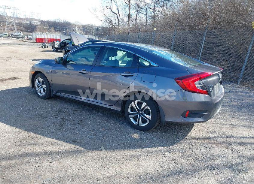 Photo 3 of 2018 Honda Civic LX (VIN 2HGFC2F58JH520543)