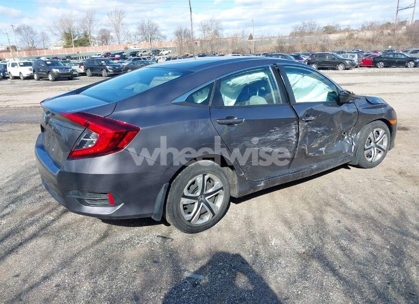 Photo 4 of 2018 Honda Civic LX (VIN 2HGFC2F58JH520543)
