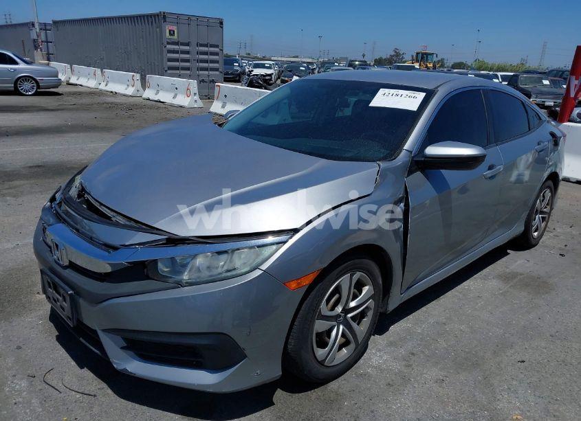 Photo 2 of 2018 Honda Civic LX (VIN 2HGFC2F58JH527122)