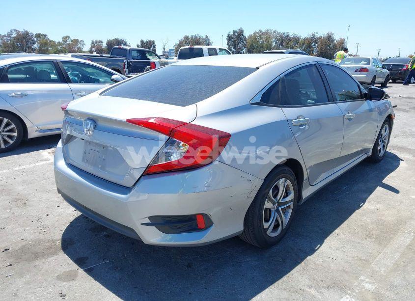 Photo 4 of 2018 Honda Civic LX (VIN 2HGFC2F58JH527122)