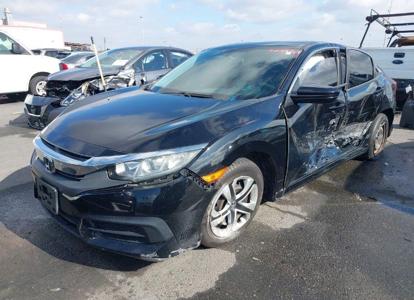 Photo 2 of 2018 Honda Civic LX (VIN 2HGFC2F58JH529131)