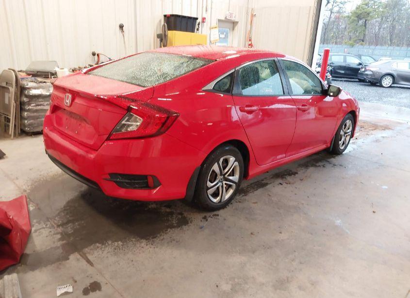 Photo 4 of 2018 Honda Civic LX (VIN 2HGFC2F58JH534989)