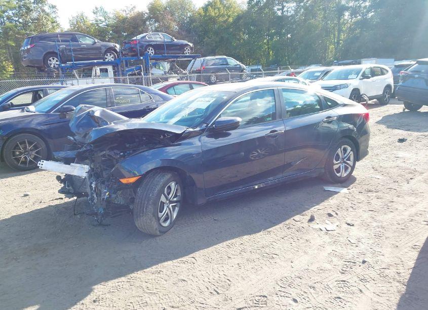 Photo 2 of 2018 Honda Civic LX (VIN 2HGFC2F58JH567166)