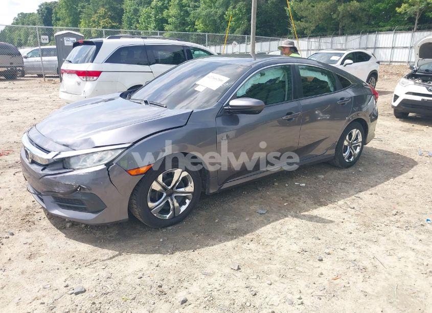 Photo 2 of 2018 Honda Civic LX (VIN 2HGFC2F58JH602336)