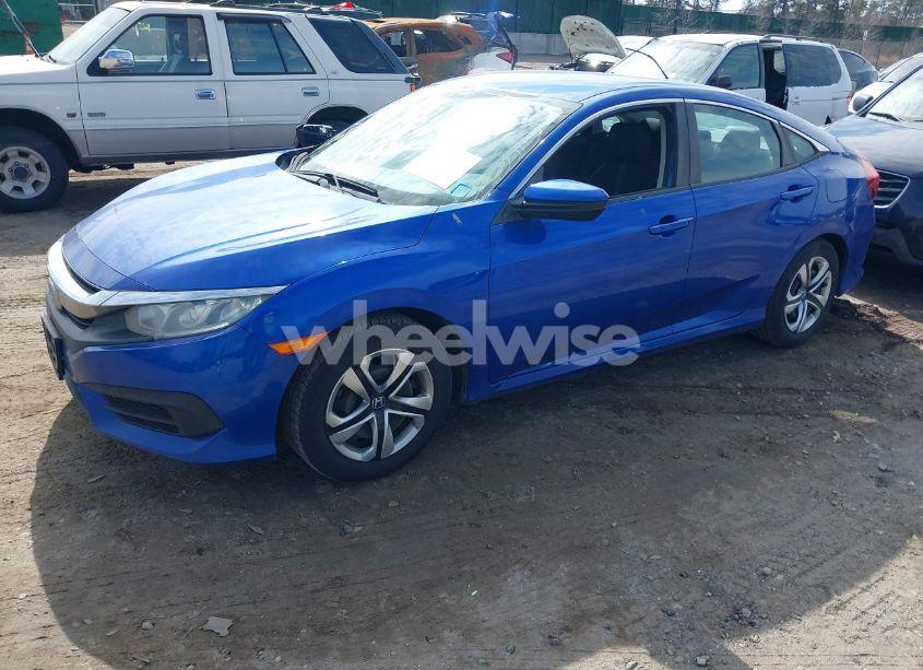 Photo 2 of 2018 Honda Civic LX (VIN 2HGFC2F58JH610288)