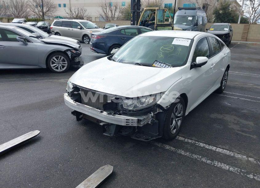 Photo 2 of 2017 Honda Civic LX (VIN 2HGFC2F59HH562181)