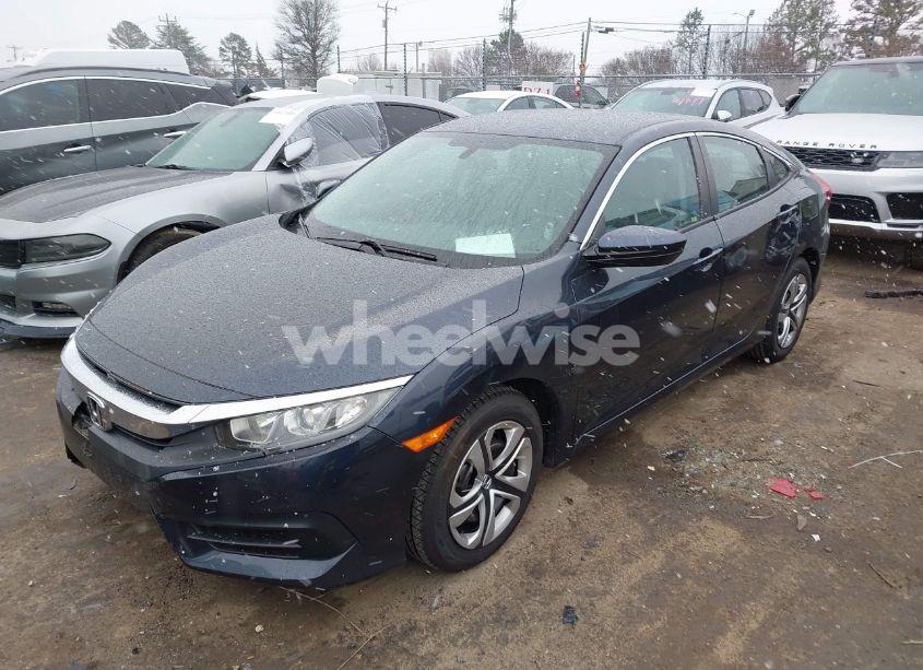 Photo 2 of 2017 Honda Civic LX (VIN 2HGFC2F59HH568451)
