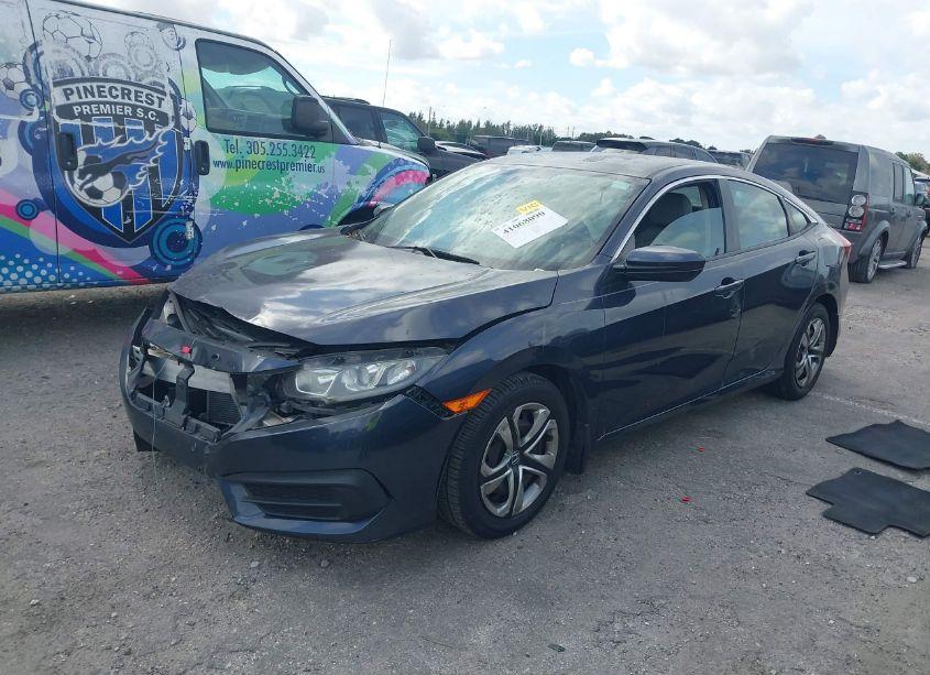 Photo 2 of 2018 Honda Civic LX (VIN 2HGFC2F59JH516565)