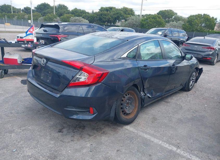 Photo 4 of 2018 Honda Civic LX (VIN 2HGFC2F59JH516565)