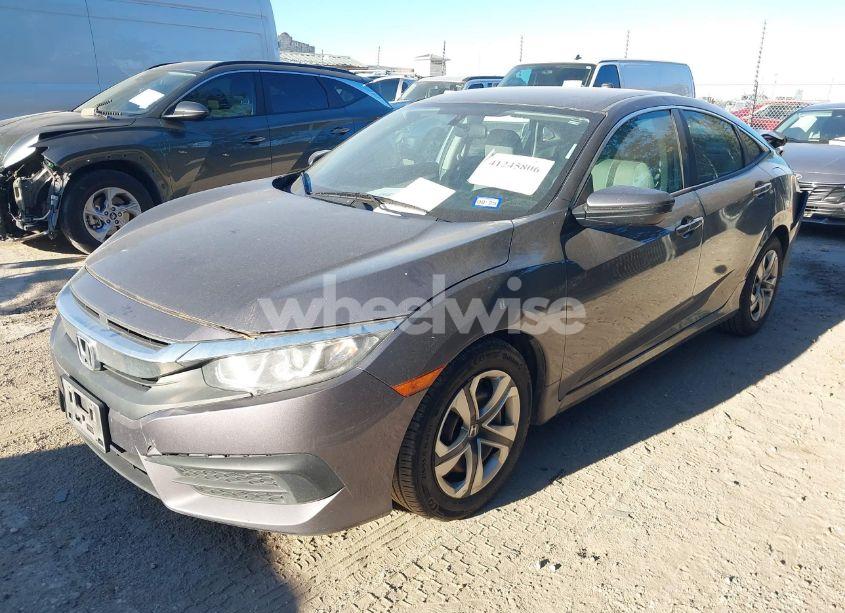 Photo 2 of 2018 Honda Civic LX (VIN 2HGFC2F59JH563532)