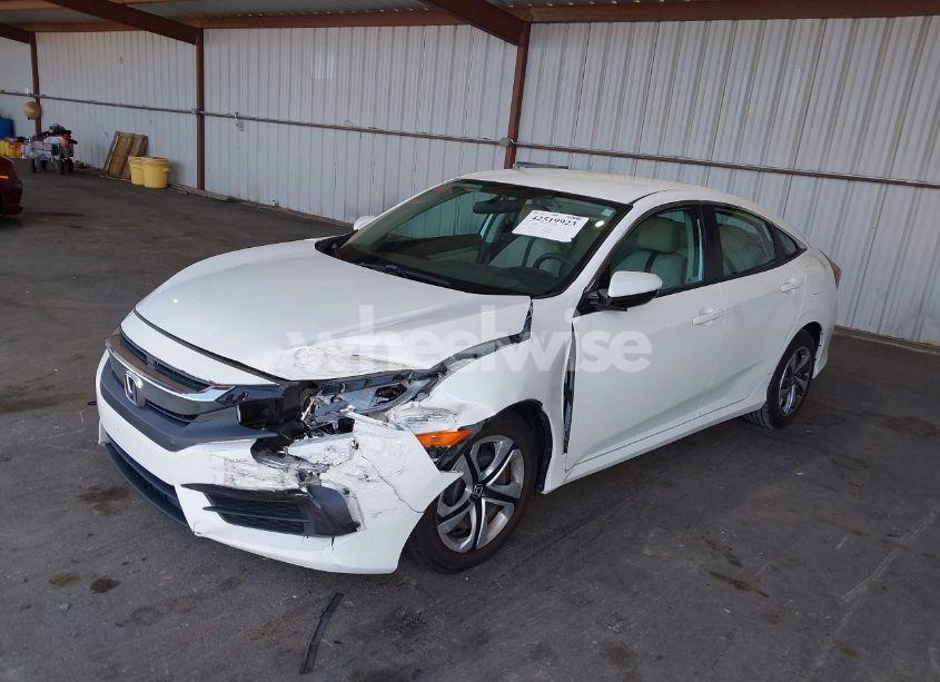 Photo 2 of 2018 Honda Civic LX (VIN 2HGFC2F59JH578189)