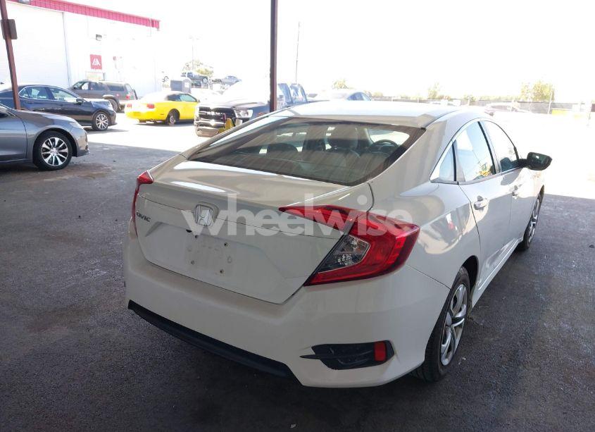 Photo 4 of 2018 Honda Civic LX (VIN 2HGFC2F59JH578189)