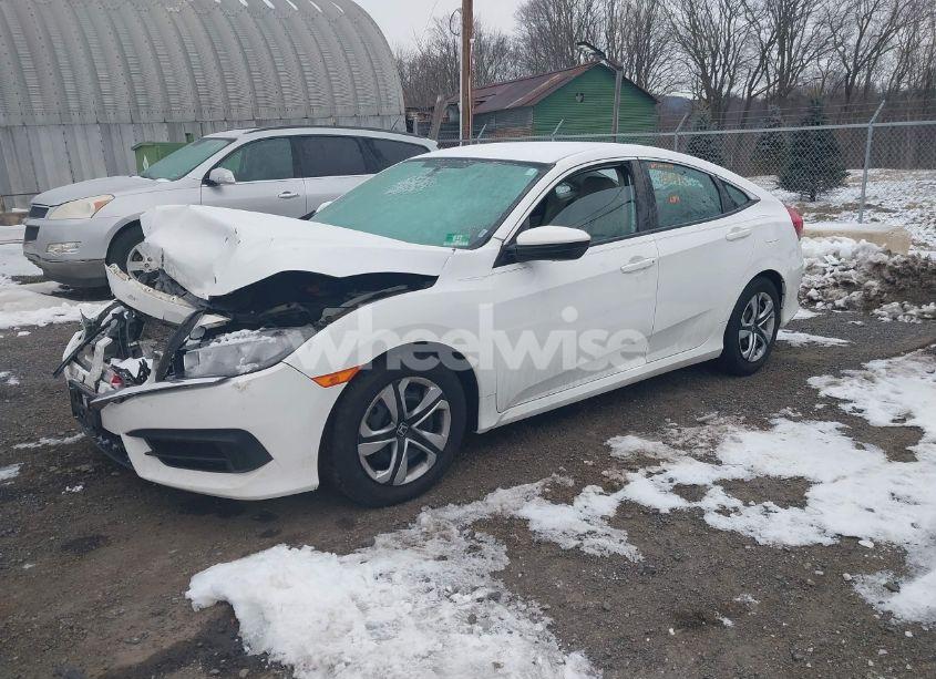 Photo 2 of 2018 Honda Civic LX (VIN 2HGFC2F59JH578581)
