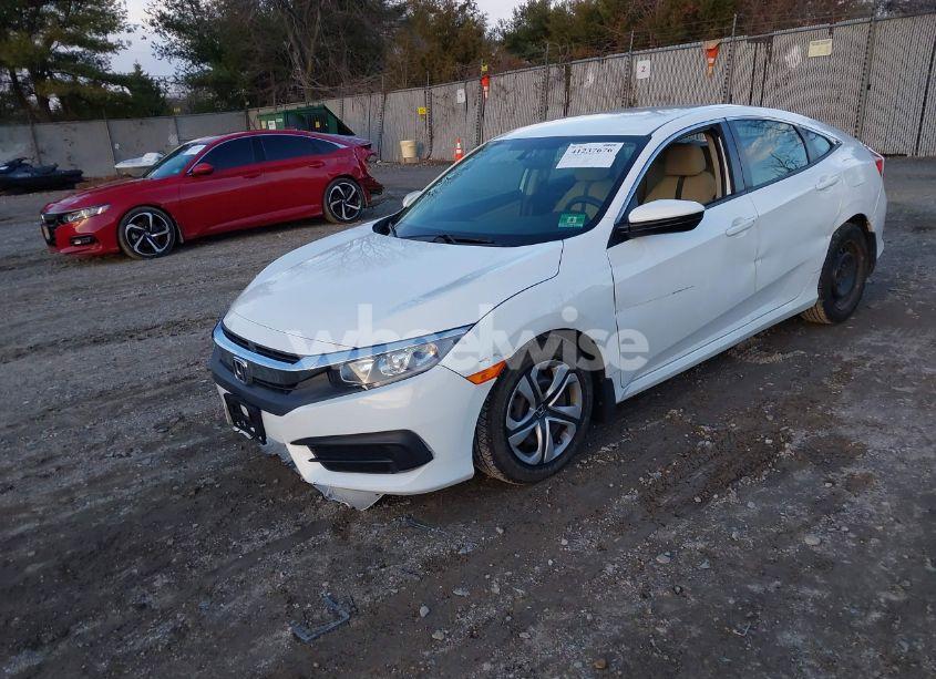 Photo 2 of 2018 Honda Civic LX (VIN 2HGFC2F59JH581576)