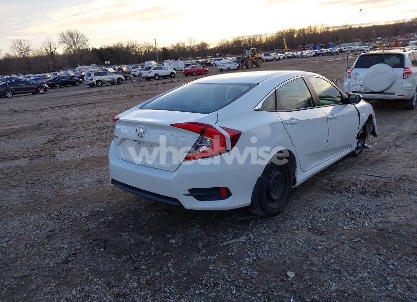 Photo 4 of 2018 Honda Civic LX (VIN 2HGFC2F59JH581576)