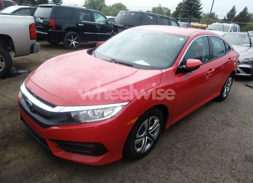 Photo 2 of 2018 Honda Civic LX (VIN 2HGFC2F59JH582744)
