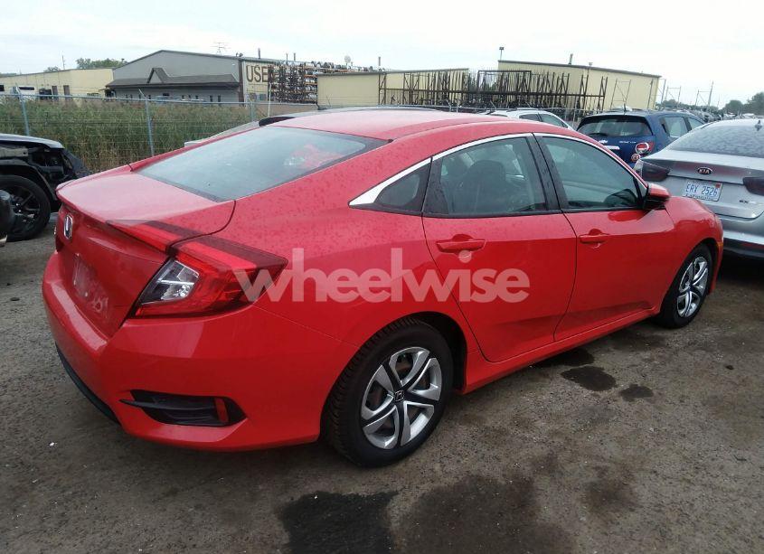 Photo 4 of 2018 Honda Civic LX (VIN 2HGFC2F59JH582744)