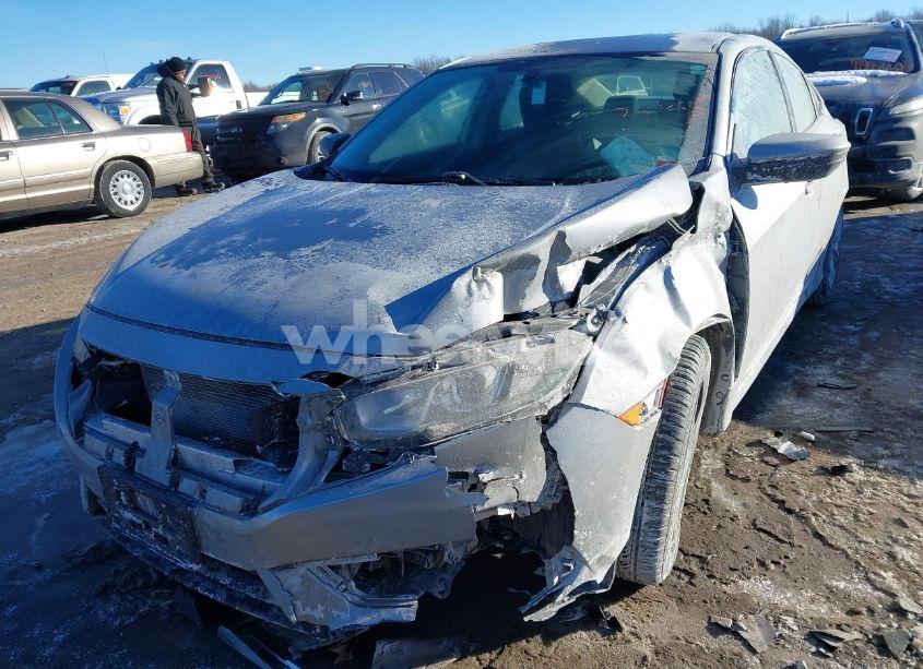 Photo 2 of 2018 Honda Civic LX (VIN 2HGFC2F59JH605827)