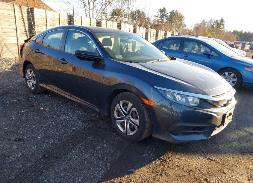 2018 Honda Civic LX (VIN 2HGFC2F59JH606394) main photo