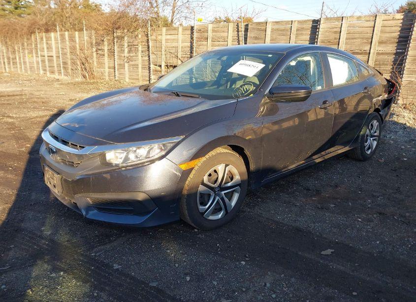 Photo 2 of 2018 Honda Civic LX (VIN 2HGFC2F59JH606394)