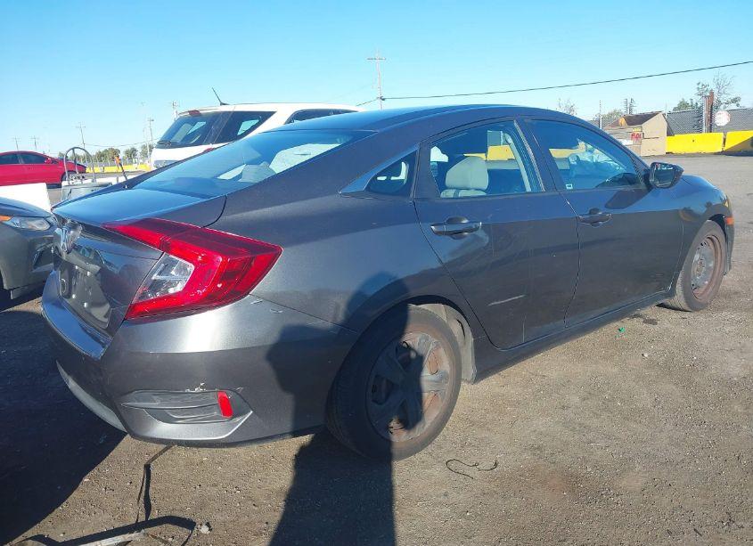 Photo 4 of 2018 Honda Civic LX (VIN 2HGFC2F59JH610607)