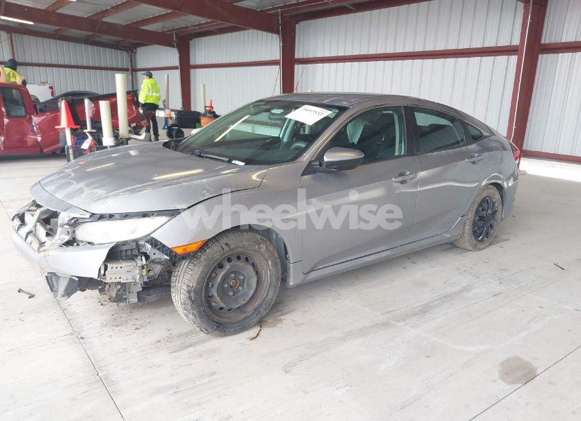 Photo 2 of 2017 Honda Civic LX (VIN 2HGFC2F5XHH506010)
