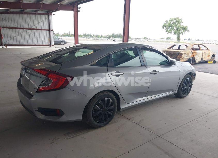 Photo 4 of 2017 Honda Civic LX (VIN 2HGFC2F5XHH506010)