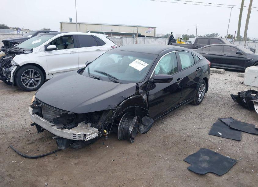 Photo 2 of 2017 Honda Civic LX (VIN 2HGFC2F5XHH510557)