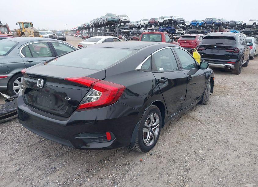 Photo 4 of 2017 Honda Civic LX (VIN 2HGFC2F5XHH510557)