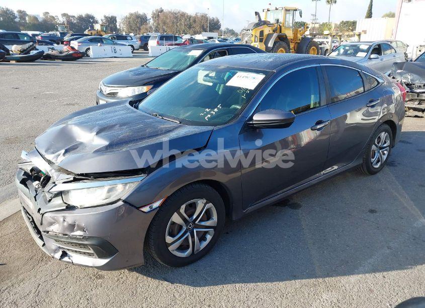 Photo 2 of 2017 Honda Civic LX (VIN 2HGFC2F5XHH520392)