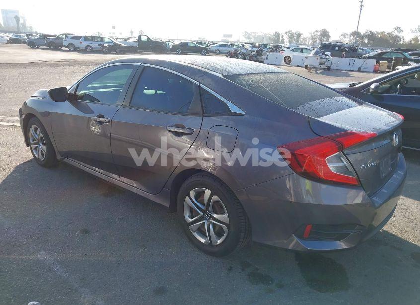 Photo 3 of 2017 Honda Civic LX (VIN 2HGFC2F5XHH520392)