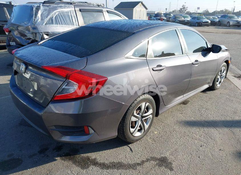 Photo 4 of 2017 Honda Civic LX (VIN 2HGFC2F5XHH520392)