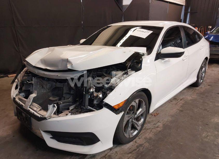 Photo 2 of 2017 Honda Civic LX (VIN 2HGFC2F5XHH524829)