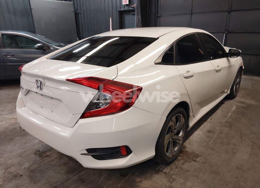 Photo 4 of 2017 Honda Civic LX (VIN 2HGFC2F5XHH524829)